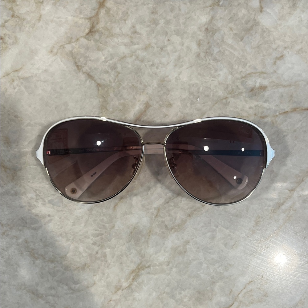 Coach Silver Frame Aviator Sunglasses with Brown Gradient Lenses